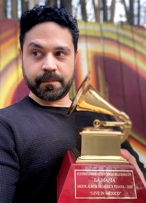 Tim Ruiz with Latin band La Mafia wins Grammy in 2021 for album Live In Mexico